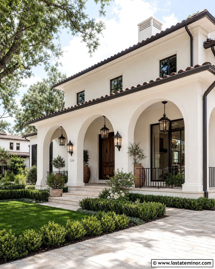 White Loggia House With Hanging Lanterns - 30 White House Design With Light Fixtures Ideas