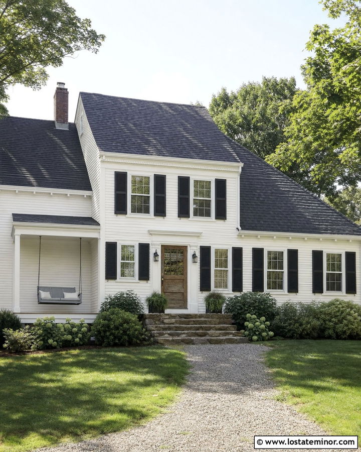 White Saltbox House With Simple Porch Swing - 30 White House Design With Swing Ideas
