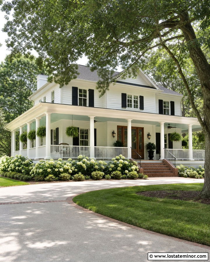 White Siding With A Wraparound Porch - 30 White House Design With Siding Ideas