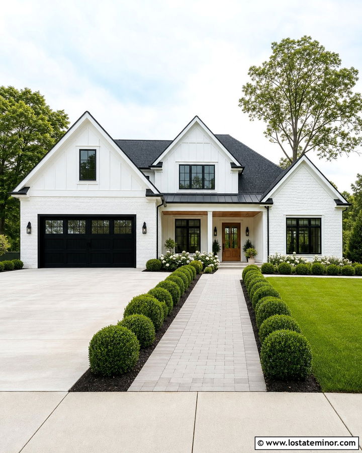 White Stone House With Black Carriage Garage Door - 30 Stone House Design With Garage Door Ideas