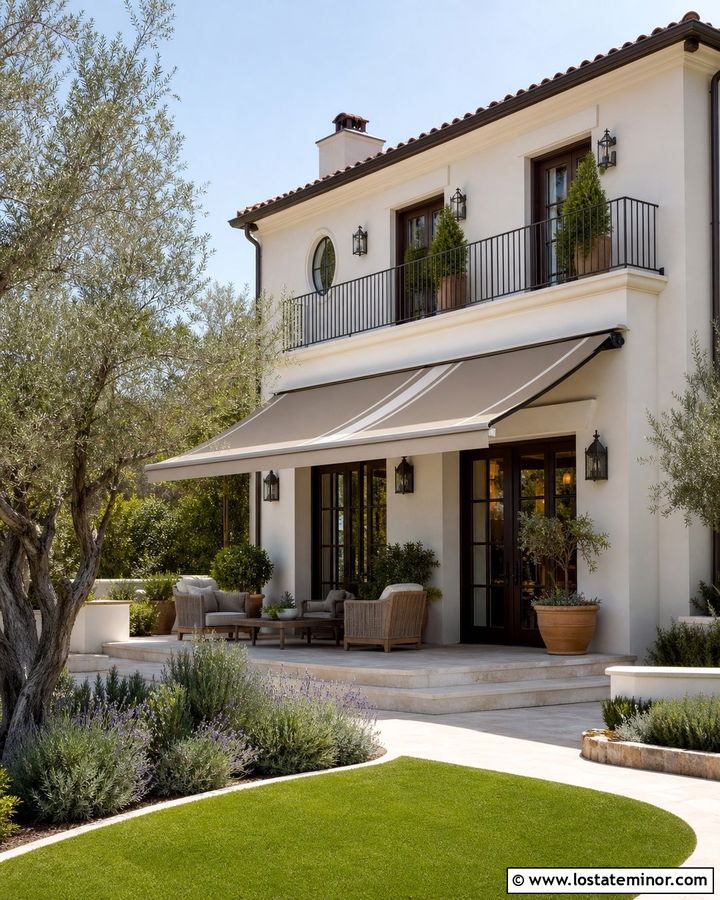 White Stucco House With Retractable Patio Awning - 30 White House Design With Awning Ideas