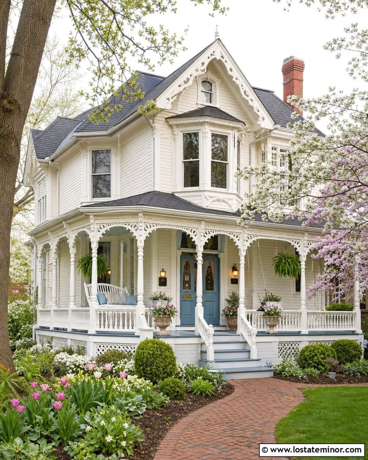 White Victorian House With Decorative Porch Swing - 30 White House Design With Swing Ideas